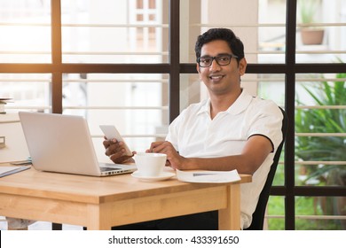 Young Indian Man Working From Home Office