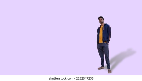 young Indian model standing confident with hands in pockets isolated - Shutterstock ID 2252547235