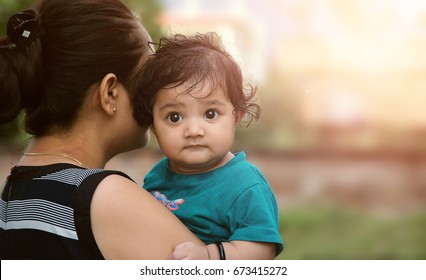 Young Indian Mother With Her Loving Baby Girl Daughter