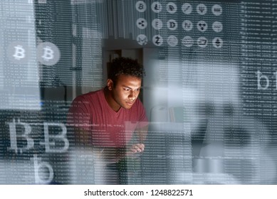 Young indian programmer thinking how to get more cryptocurrency