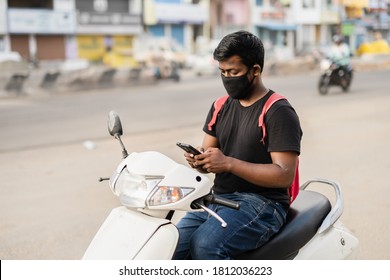 Young Indian Tamil Guy Chatting On Phone During Corona Pandemic In Chennai, Tamil Nadu, India