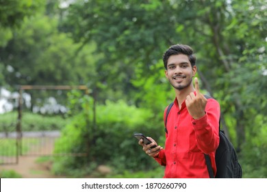 Young Indian Voter Showing Finger