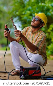 Young Indian Welder Working At Iron Factory.