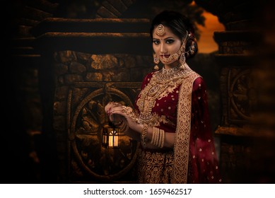 Young Indian Woman in Bridal wear and make-up - Powered by Shutterstock