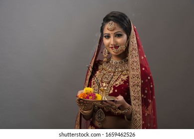 Young Indian Woman in Bridal wear and make-up