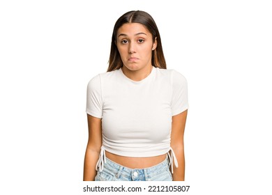 Young Indian Woman Isolated Cutout Removal Background Shrugs Shoulders And Open Eyes Confused.