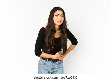 Young Indian Woman Isolated On Purple Background Having A Liver Pain, Stomach Ache.