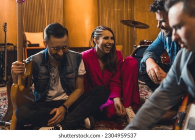 Young indie rock band playing the rehearsal before the concert . High quality photo - Powered by Shutterstock