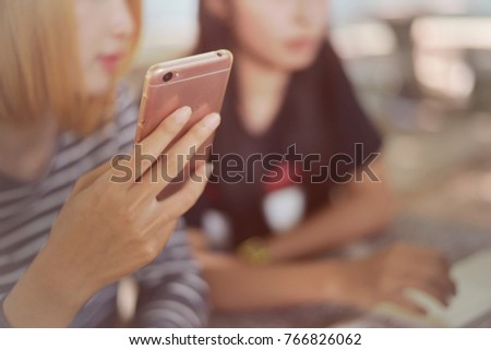 Young Influencer Using Social Media on Smartphone, Like, Follower, Comment. Cute and pretty  hipster millennial girl share on internet social media. self absorbed new generation of young people