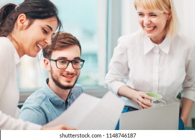 Young Intern Receives Feedback from Colleagues