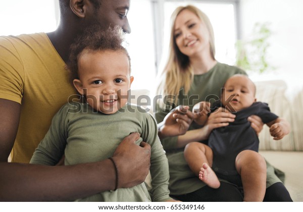 young-interracial-family-little-children-600w-655349146.jpg