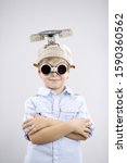 Young inventor boy wearing goggles