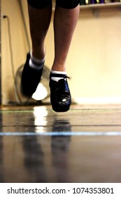 Young Irish Dance Girl in Hard Jig Shoes Rehearsing in a Studio - Shutterstock ID 1074353801