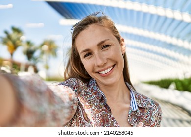 Young irish girl smiling happy make selfie by the smartphone at the city.