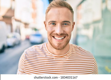 Young Irish Man Smiling Happy Walking At Street Of City.