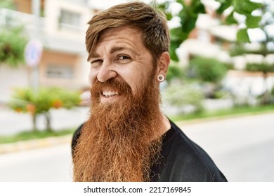 Young Irish Man Smiling Happy Standing At The City.