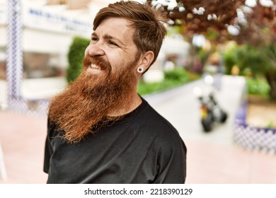 Young Irish Man Smiling Happy Standing At The City.