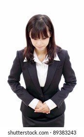 Young Japanese Business Woman Making Apology