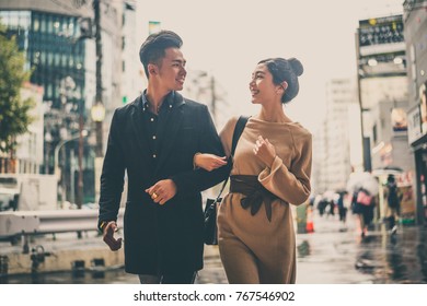 Young Japanese Couple Spending Time Together In Tokyo