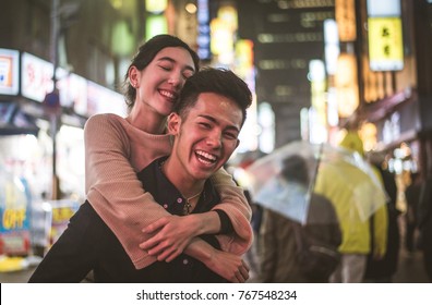 Young Japanese Couple Spending Time Together In Tokyo