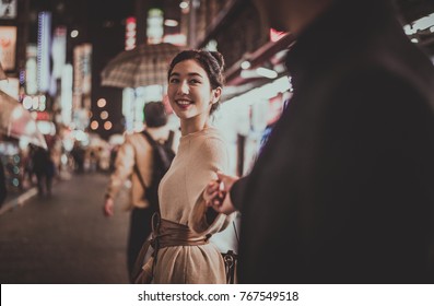 Young Japanese Couple Spending Time Together In Tokyo