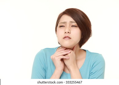 Young Japanese Woman Having Throat Pain