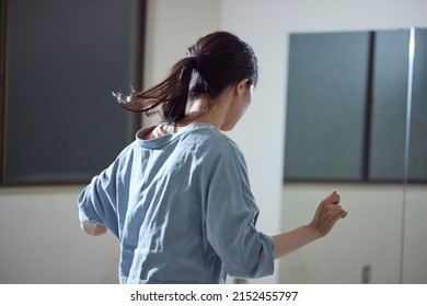 Young Japanese Woman Practicing Dance