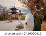 Young Japanese woman in a traditional Kimono dress at Shinnyodo temple in Kyoto, Japan