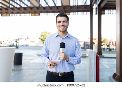 Young Journalist Looks Confident Before Taking Down Another Newscast