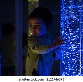 Young Kid Exploring A Multi Sensory Space - Snoezelen Concept