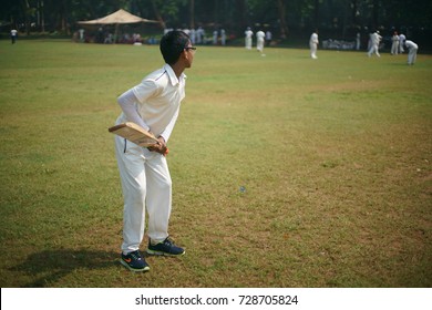 A Young Kid Is Seen Batting And Playing Cricket With Some Boys At His Cricket Coaching Academy, At Oval Maidan, Churchgate, Mumbai, Maharashtra, India. Shot In October 2017.