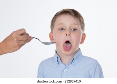 Young Kid Takes Syrup With A Very Bad Taste