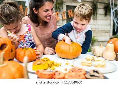 Young Kids Carving Halloween