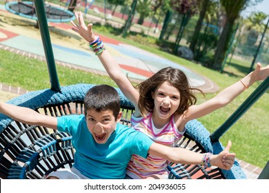 Young Kids Having Fun In The Park