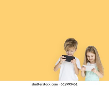 Young Kids Playing Mobile Phone