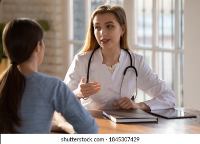 Young lady client patient visiting pleasant attentive female doctor physician at modern clinic medical center, listening to detailed recommendations of qualified specialist, discussing health problems - Shutterstock ID 1845307429