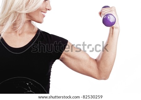 Young lady doing workout with weights
