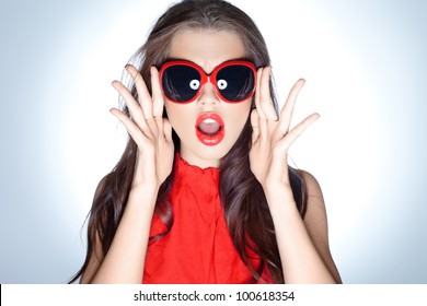 Young Lady With Huge Sunglasses On White