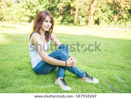 Young lady relax in natural garden