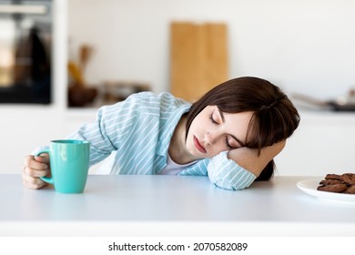 Young Lady Sleeping On Table Holding Stock Photo 2070582089 | Shutterstock