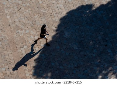 Young Lady, Walking.Light And Shadow. October 19th 2022 Greece. 