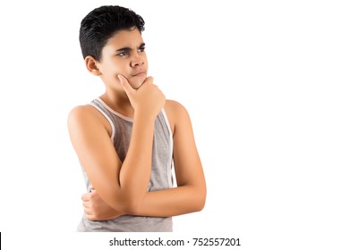 Young latin boy in a pensive pose isolated on white