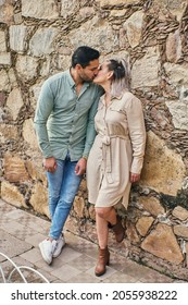 Young Latin Male And Female Couple In Love Kissing Between 25 And 35 Years Old