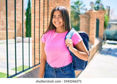 Young Latin Student Girl Smiling Happy At University Campus