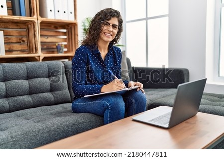 Young latin woman having online psychology session at psychology center Foto stock © 