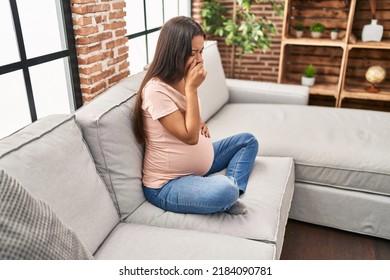 Young Latin Woman Pregnant With Puke Expession At Home