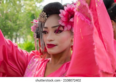 Young Latin Woman Wearing Geisha Makeup 