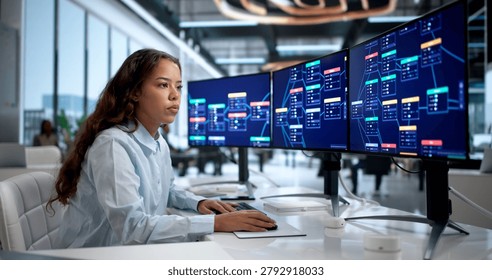 Young Latina Software Developer Creates App Visually Using Low Code Platform.