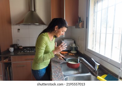 Young Latina Woman, In The Kitchen, Cooking, Burnt Food
