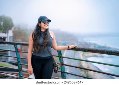 Young Latina woman smiling and relaxing on a park bench in Miraflores, Lima, Peru, enjoying a pleasant day outdoors. - Powered by Shutterstock